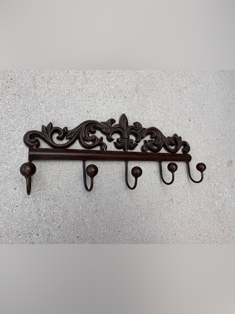Ornate Fleur-de-Lis Iron Wall Hook Rack in Dark Brown